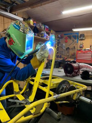 Kris Karts servicing a go kart